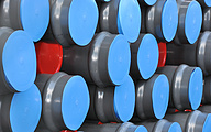  Stock grey plastic pipes with red and blue caps